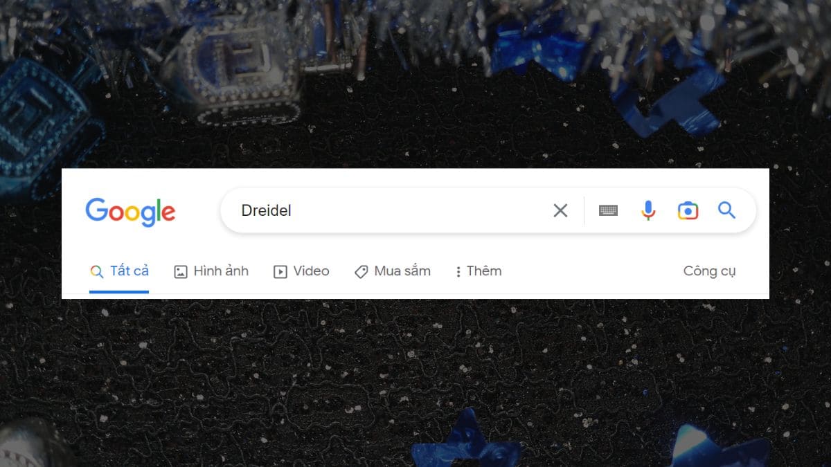 Cách chơi xoay con quay dreidel trên google