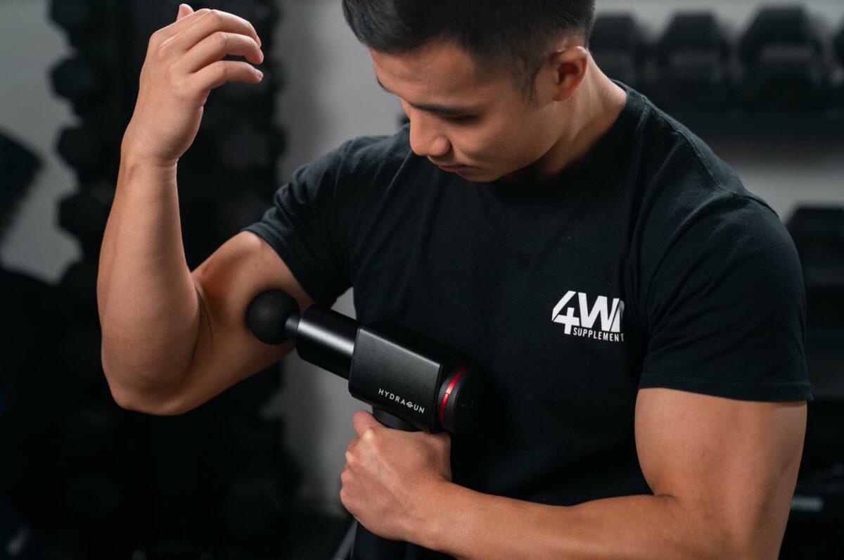 Sử dụng súng massage trước khi tập luyện